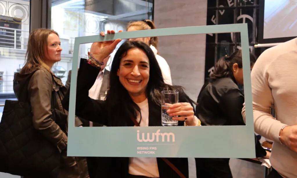 woman holding a frame