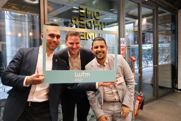 three men posing for a picture